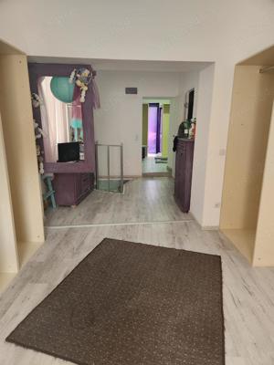 Dau in chirie apartament la casa pentru locuit sau spatiu firme