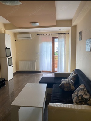 Zona Bucovina-Torontalului, apartament 2 camere, etaj 1, bloc nou, chirie 400 euro  luna  - imagine 2