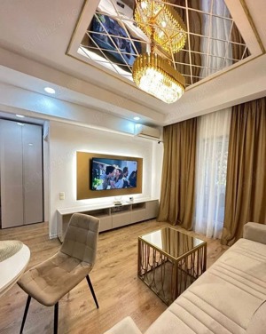 Apartament de 2 camere, elegant, cu grădină proprie de 60 mp, situat într-o zonă prestigioasă. - imagine 3