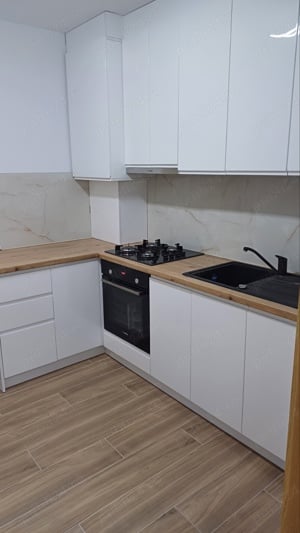 Ofer spre vânzare apartament nou , et1cu lift,centrala proprie în Radauti Sv - imagine 5