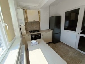 Închiriez apartament cu 2 camere - imagine 2