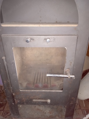 Vind șemineu din fonta