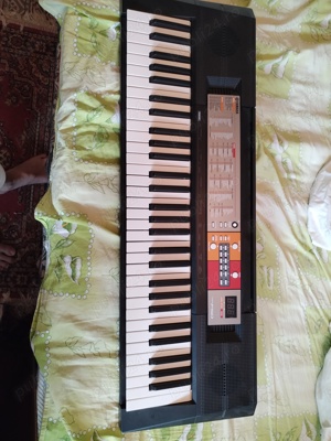 Schimb orga Yamaha cu ghitara clasica