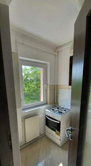 Schimb garsoniera cu apartament 