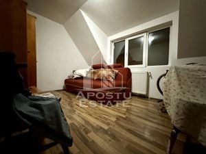 Apartament 3 camere, centrala proprie, situat in zona Dambovita - imagine 3