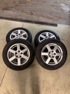 Jante magneziu cu cauciucuri in stare foarte bună  Dunlop de iarna.