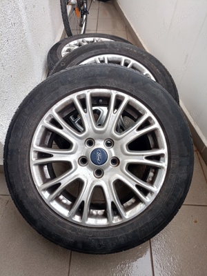 Vând set 4  jante aluminiu ford originale cu cauciucuri de vara Michelin pe 16 ", stare perfecta  - imagine 4