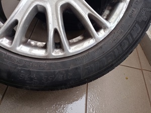 Vând set 4  jante aluminiu ford originale cu cauciucuri de vara Michelin pe 16 ", stare perfecta  - imagine 5