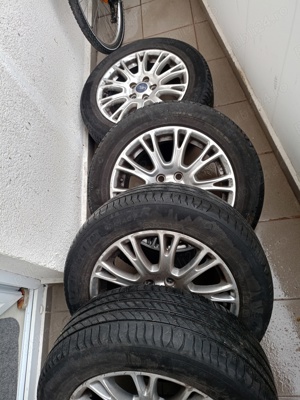 Vând set 4  jante aluminiu ford originale cu cauciucuri de vara Michelin pe 16 ", stare perfecta 