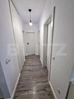 Apartament modern, 3 camere, 2 bai, garaj, zona centrala Floresti ! - imagine 7