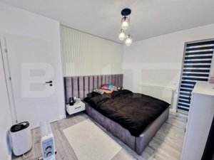 Apartament modern, 3 camere, 2 bai, garaj, zona centrala Floresti ! - imagine 16