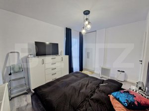 Apartament modern, 3 camere, 2 bai, garaj, zona centrala Floresti ! - imagine 17