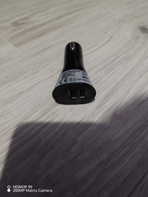 Încărcător auto nou