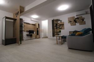 Apartament modern, 2 locuri de parcare, bloc nou, balcon generos, living spațios - imagine 2