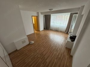 Baba Novac apartament 2 camere cu balcon etajul 1 bucătărie mobilata living dulap +2 comode zugrăvit - imagine 2