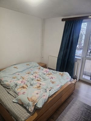 Dau in chiere apartament de 2 camere - imagine 4