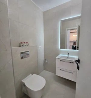 Închiriez apartament sau garsoniera in regim hotelier  - imagine 6