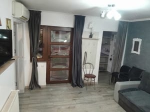 vand casa cu 4 camere si spatiu comercial la strada si o garsoniera in curte - imagine 9