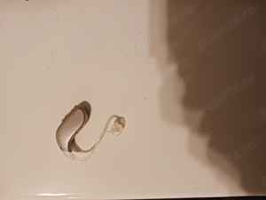 Caut specialist reglaj aparat auditiv Oticon BTE P  BTE, eventual vand