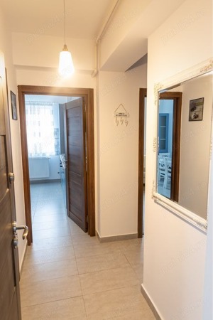 apartament 2 camere-ozana-parcare proprie-centrala proprie-modern - imagine 2