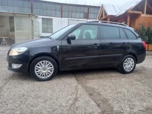 Skoda Fabia 1.2 tdi 2012 - imagine 8