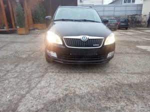 Skoda Fabia 1.2 tdi 2012 - imagine 6