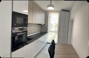 Ofer spre închiriere apartament modern mobilat și utilat, loc de parcare inclus - imagine 2