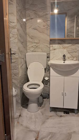 vând apartament sau schimb cu casa - imagine 2