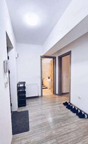 Se oferă spre închiriere apartament cu 2 camere - imagine 5