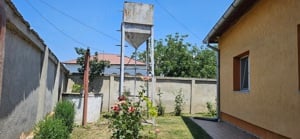 Casă și curte ( 30 ari) de vânzare în comuna Fărcasele, sat Ghimpați, jud. Olt - imagine 3