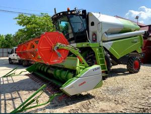 De vanzare Claas Tucano 320 sau schimb cu John Deere w540