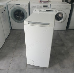 Masina de spălat rufe Whirlpool    cu incarcare verticala. 