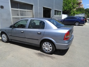 Doar ptr piese ( este Radiata) OPEL ASTRA G motor 1,7 din 2006 - imagine 4 Doar ptr piese ( este Radiata) OPEL ASTRA G motor 1,7 din 2006 - imagine 4