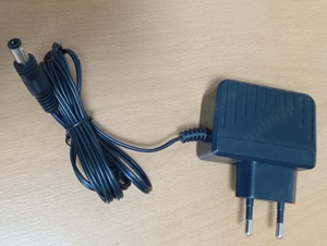 Vând Alimentator 12V 1A