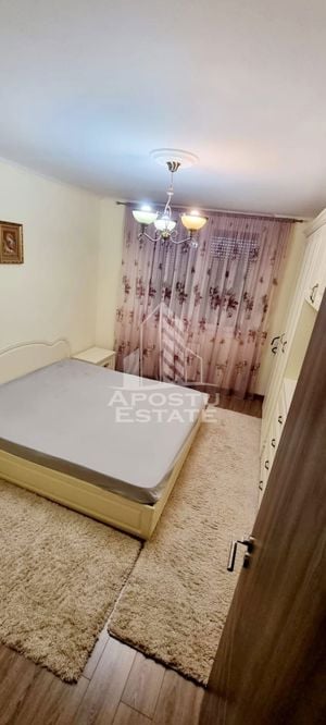 Apartament cu 3 camere,100 mp,decomandat,etaj intermediar,zona Intim - imagine 2