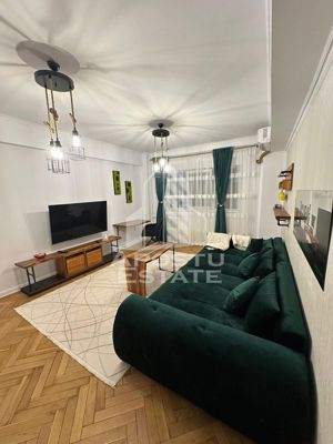 Apartament 2 camere, etaj intermediar decomandat in Piata Unirii.