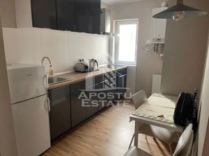 Apartament cu 3 camere, decomandat ,situat in zona Spitalul Judetean - imagine 2