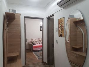 Apartament doua camere, decomandat, etaj zece, renovat, mobilat si utilat, priveliste superba liber  - imagine 8