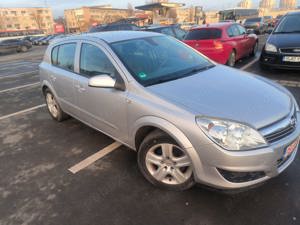 Opel Astra H 1.6 benzina 116 cp 153000km - imagine 7