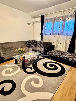 Apartament cu 3 camere in zona Dambovita, centrala proprie