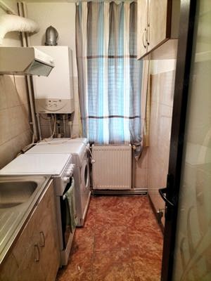 Închiriez apartament 3 camere parter  - imagine 8