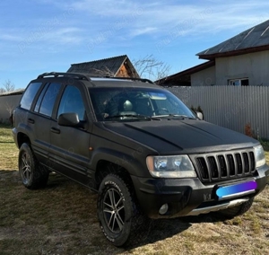 Jeep Grand Cherooke autoutilitara 4 locuri