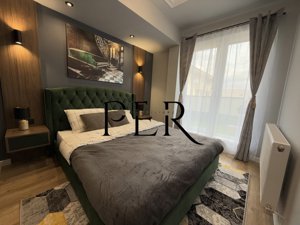 Eleganță și confort – Apartament de lux cu terasă generoasă - imagine 11