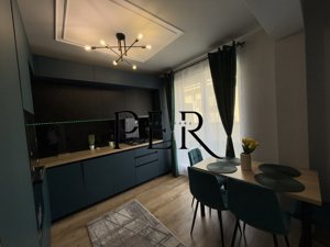 Eleganță și confort – Apartament de lux cu terasă generoasă - imagine 6