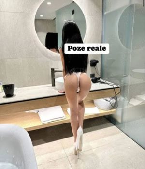 Brunetă sexi  am revenit  pupici  - imagine 2