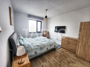 Apartament 3 camere 2 bai de vanzare zona Tractorul loc de parcare - imagine 4