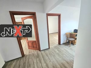 apartament cu patru camere transformat în spațiu comercial  - imagine 3