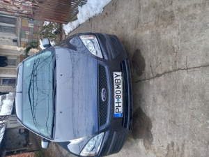 Vând Ford focus breakfast.an fabricație 2006.km 286000.itp până în  decembrie 2025.cinci uși cârlig, - imagine 8