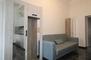 Apartament utilat  modern , situat la parter, curte coumuna privata