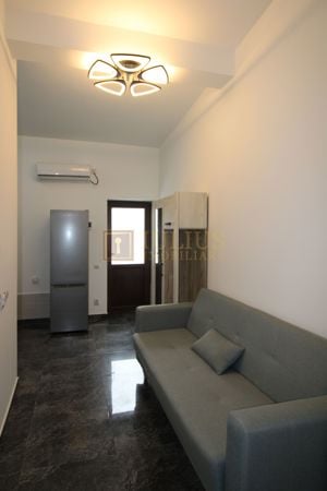 Apartament utilat  modern , situat la parter, curte coumuna privata - imagine 9